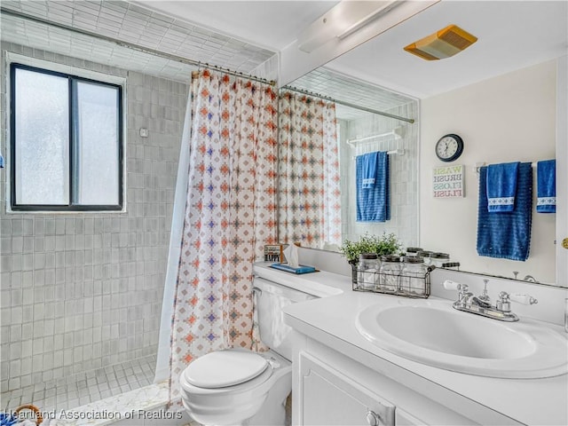 5514 Matanzas Dr, Sebring, FL 33872 - bathroom featuring vanity, toilet, and walk in shower