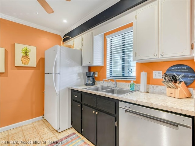 5514 Matanzas Dr, Sebring, FL 33872 - kitchen with sink, dishwasher, ornamental molding, white cabinets, and white fridge