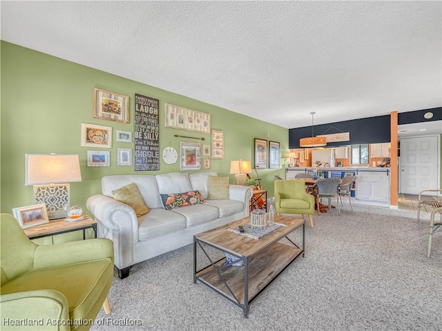 5514 Matanzas Dr, Sebring, FL 33872 - living room featuring carpet flooring and a textured ceiling