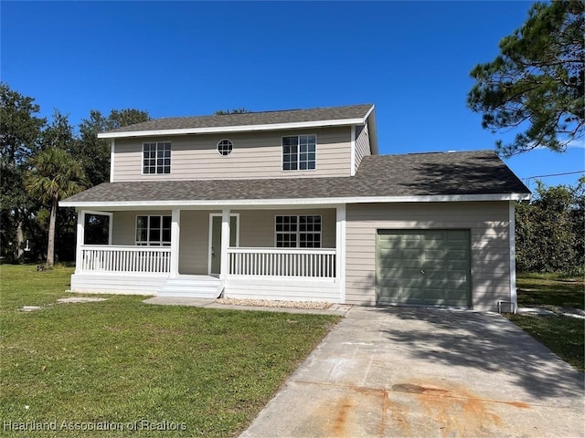 view of front of home with a front yard, a porch, and a garage