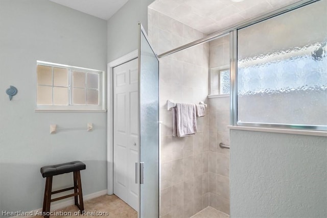 bathroom featuring an enclosed shower