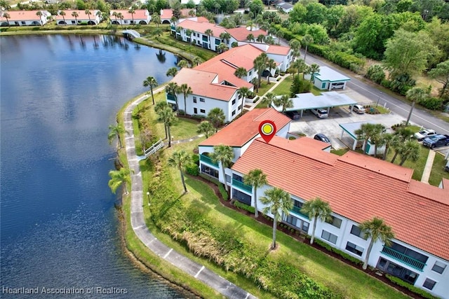 drone / aerial view with a water view