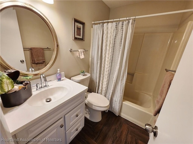 full bathroom featuring wood-type flooring, vanity, shower / bath combination with curtain, and toilet