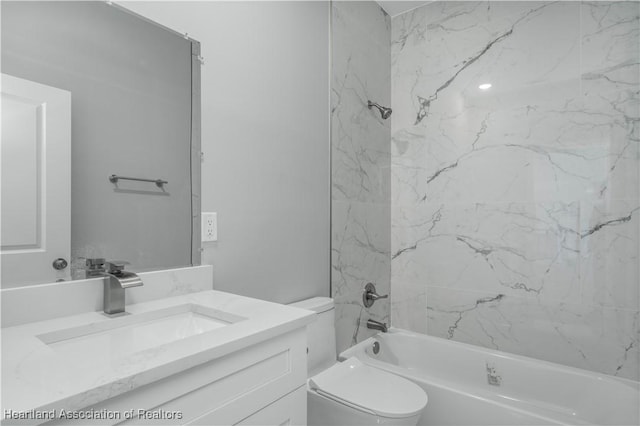 full bathroom with shower / washtub combination, vanity, and toilet