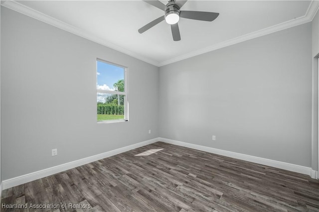 empty room featuring ceiling fan, crown molding, and dark hardwood / wood-style floors