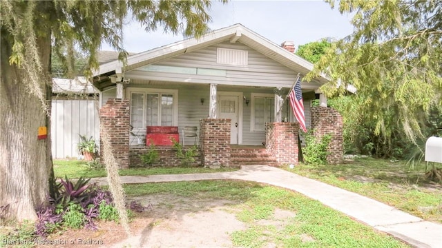 bungalow-style home featuring covered porch