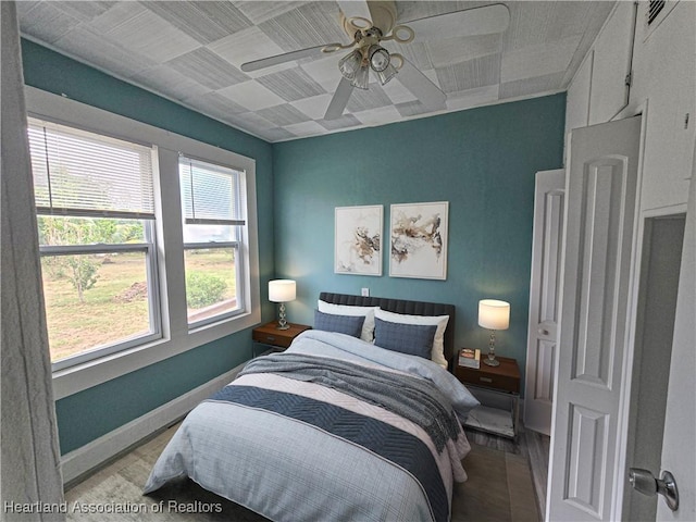 bedroom featuring ceiling fan