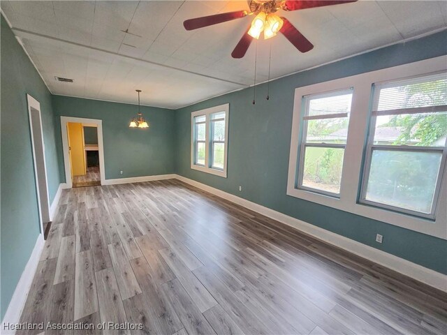 living room featuring hardwood / wood-style flooring and ceiling fan