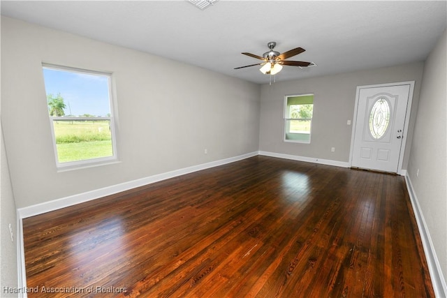 foyer featuring dark hardwood / wood-style floors and ceiling fan