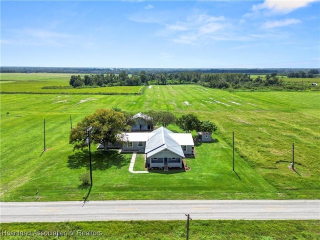 birds eye view of property with a rural view