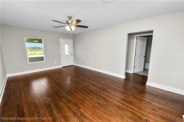 interior space featuring ceiling fan and dark hardwood / wood-style floors