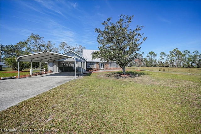 3150 Schontag Rd, Wauchula, FL 33873 - view of yard with driveway and a carport