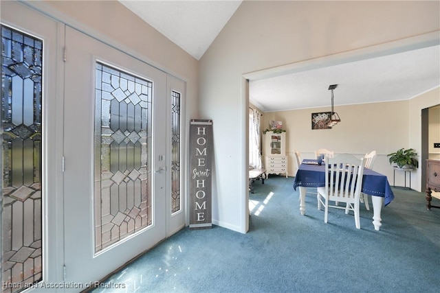 3150 Schontag Rd, Wauchula, FL 33873 - entryway with lofted ceiling, baseboards, and carpet