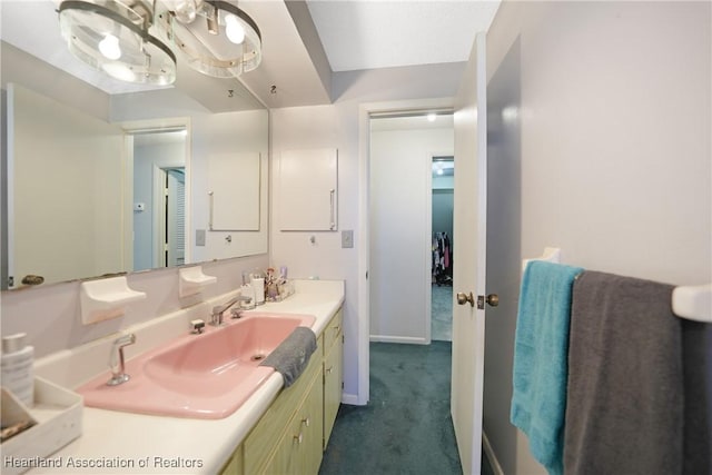 3150 Schontag Rd, Wauchula, FL 33873 - bathroom with vanity and baseboards