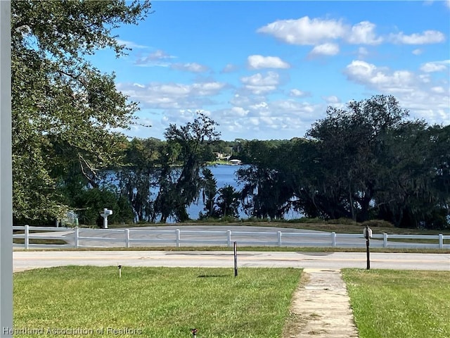 view of street with a water view