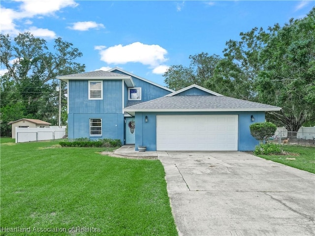 289 Georgetown Loop, Wauchula, FL 33873 - view of front of house featuring a garage, driveway, and a shingled roof
