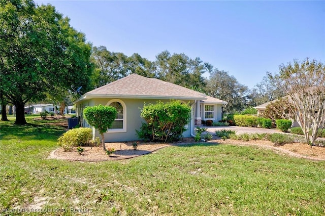 view of home's exterior with a lawn