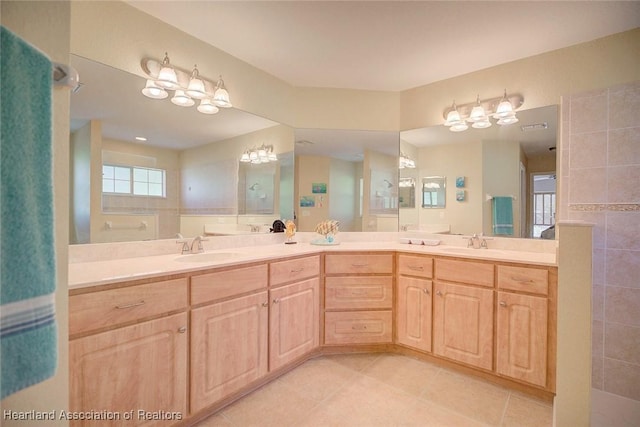 bathroom featuring tile patterned floors and vanity