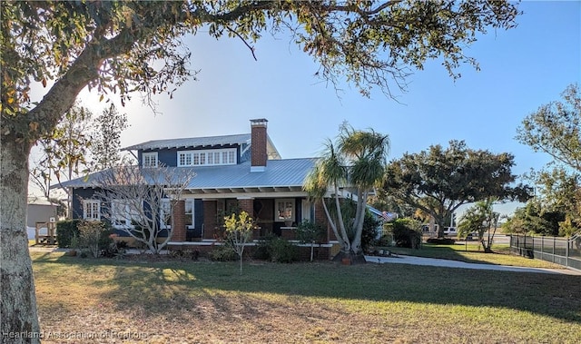 view of front of home with a front lawn