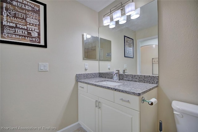 2112 Coral Ct, Sebring, FL 33870 - bathroom featuring vanity and toilet