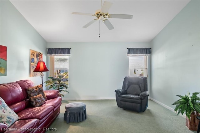 living room with carpet floors and ceiling fan