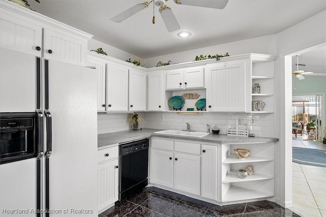 kitchen featuring black dishwasher, backsplash, white refrigerator with ice dispenser, white cabinets, and sink