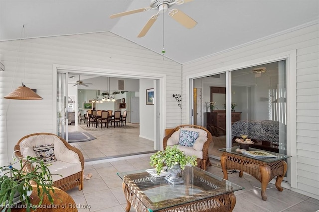 sunroom / solarium featuring lofted ceiling