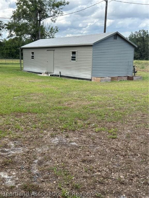 view of home's exterior with a lawn