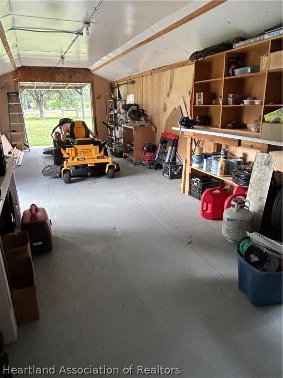 garage with a workshop area