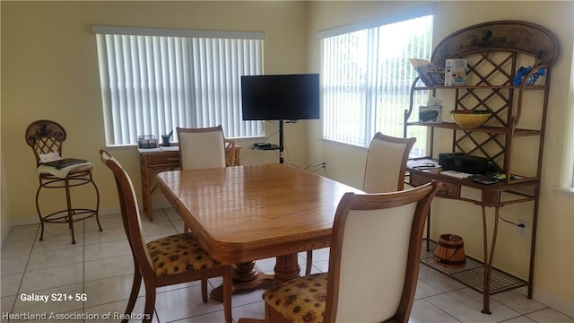 dining room with light tile patterned floors