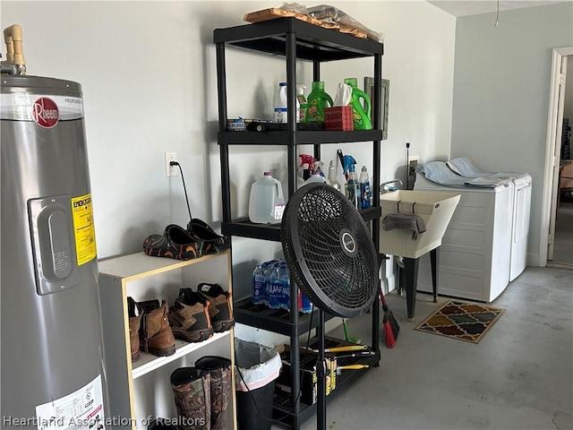 interior space featuring electric water heater, separate washer and dryer, and sink