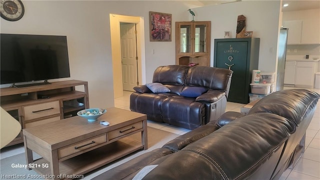 living room with light tile patterned floors