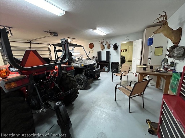 garage featuring a workshop area