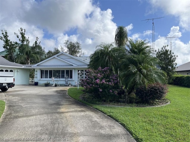 ranch-style home with a front yard