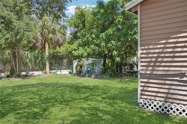 view of yard with a shed