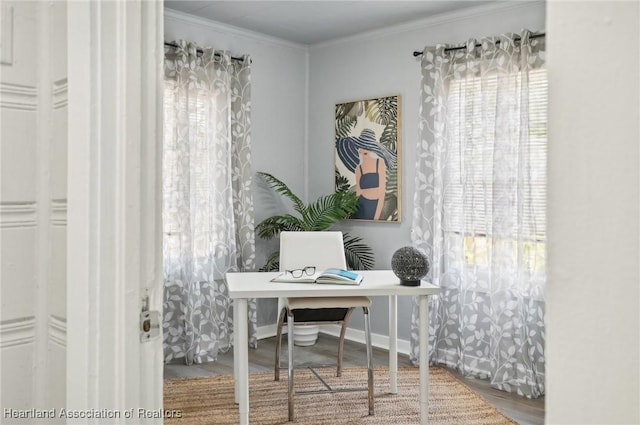 home office featuring hardwood / wood-style flooring and ornamental molding