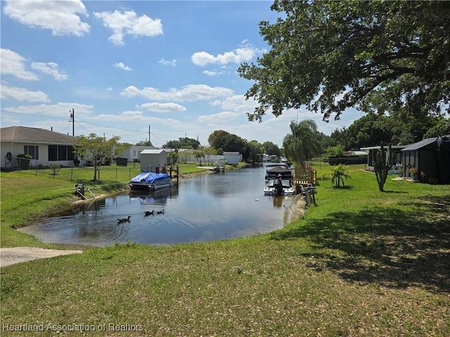 property view of water with a boat dock