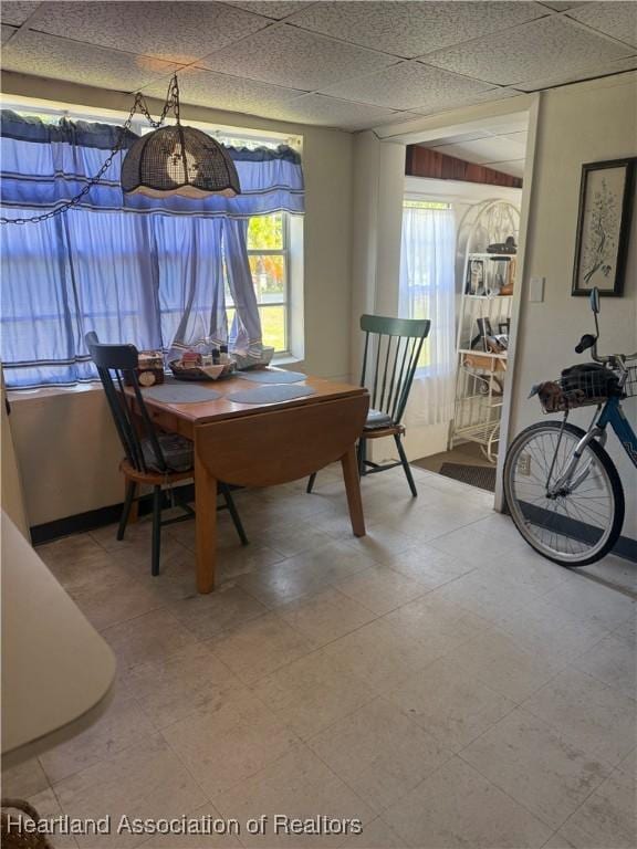 dining space with baseboards