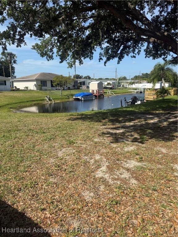 view of yard with a water view
