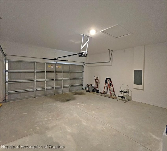3040 W Joliet Rd, Avon Park, FL 33825 - garage with a garage door opener and electric panel