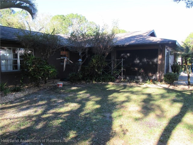 view of yard with a garage