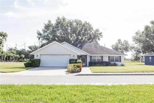 2992 Oaks Bnd, Bowling Green, FL 33834 - ranch-style home featuring concrete driveway, a garage, and a front yard