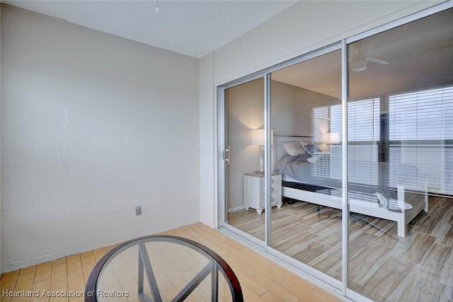 bedroom with wood finished floors