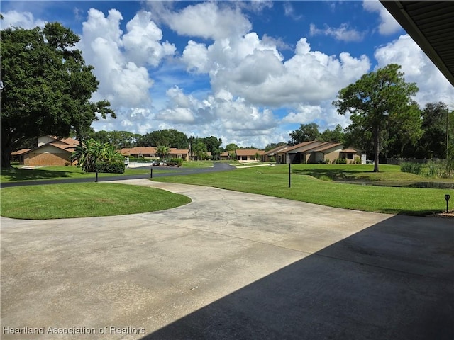 view of community featuring a lawn