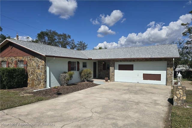 single story home with a garage