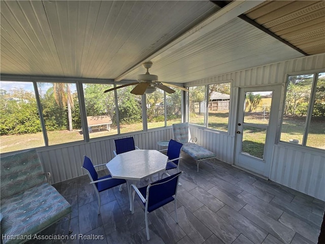 sunroom / solarium with wood ceiling