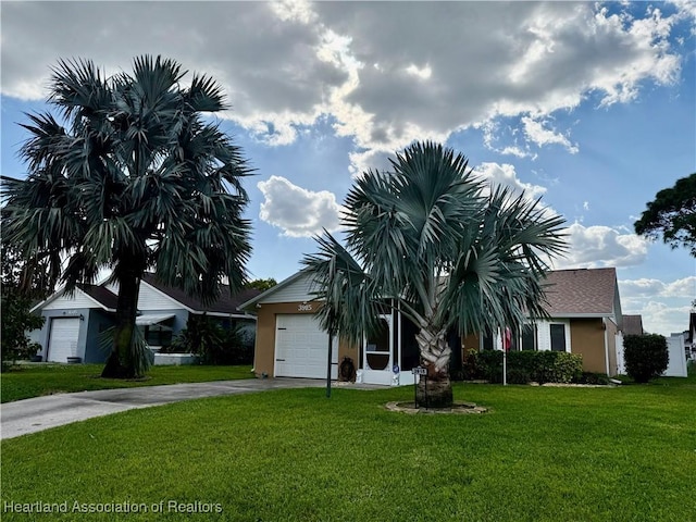 obstructed view of property featuring a garage, a front yard, concrete driveway, and stucco siding