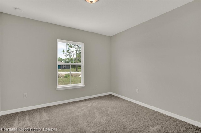 view of carpeted spare room