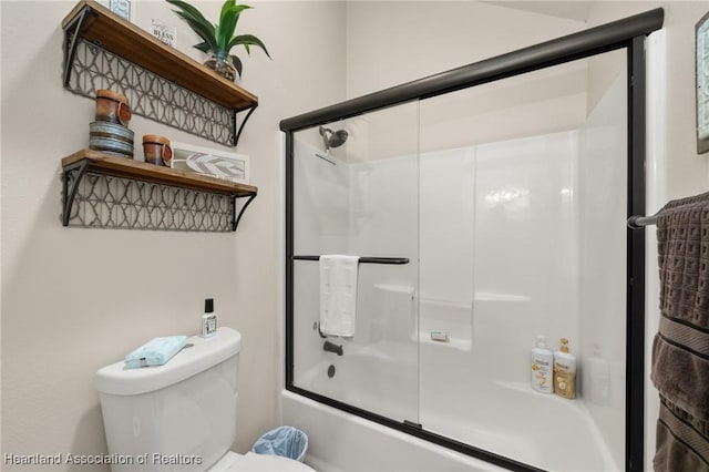 509 Bear Rd, Lake Placid, FL 33852 - bathroom with shower / bath combination with glass door and toilet