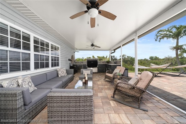509 Bear Rd, Lake Placid, FL 33852 - view of patio / terrace with an outdoor living space, a ceiling fan, and a sink